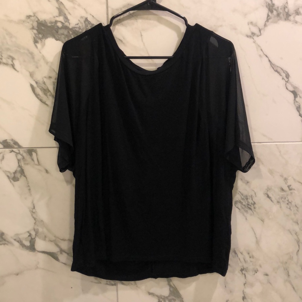 Black tee with sheer sleeve, cut out back